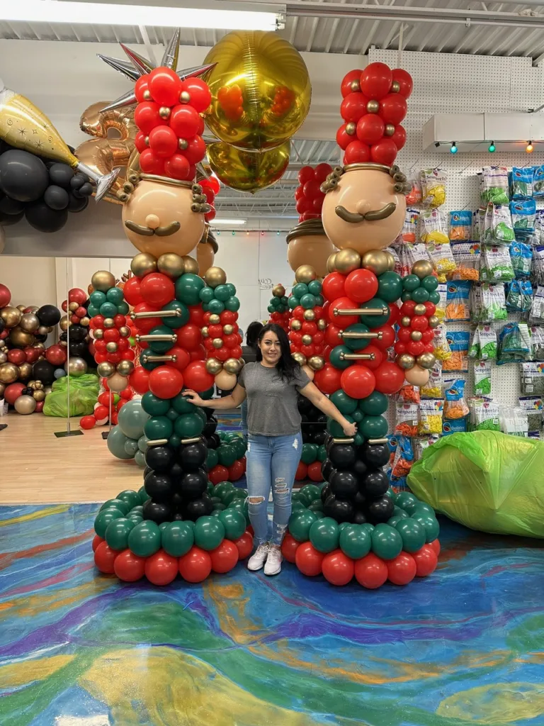 Luxury 12-foot balloon nutcrackers in red, gold, and green by Party Perks STL, perfect for Christmas and corporate holiday décor in St. Louis.