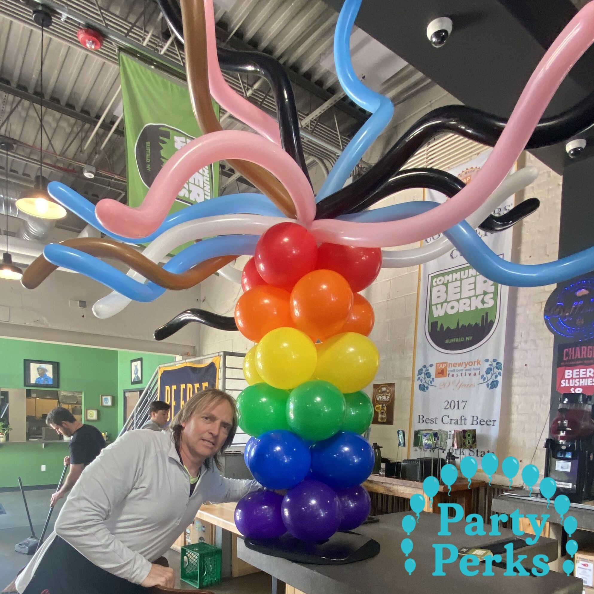cropped-st-louis-pride-balloon-towers.jpg Rainbow balloon column towers for Pride event decorations created by St Louis balloon decorator Party Perks