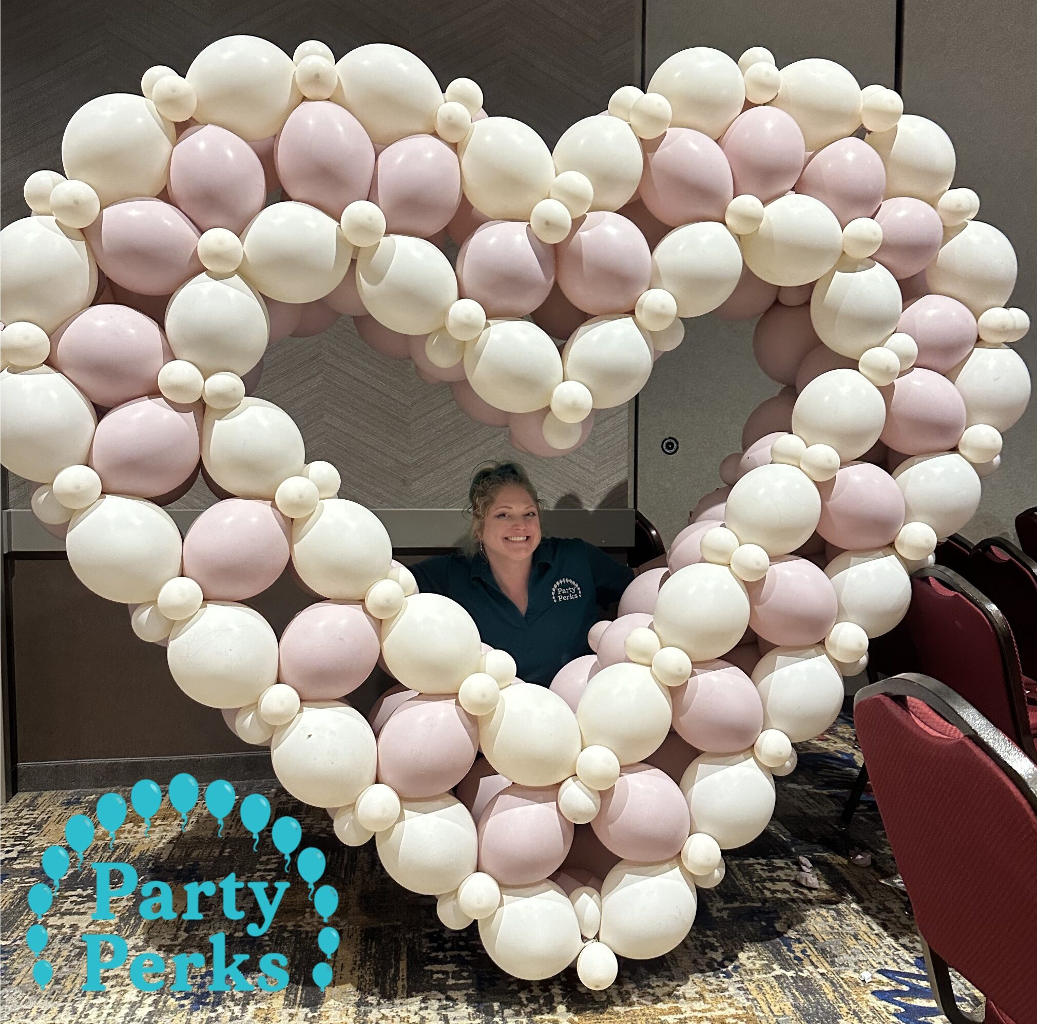 cropped-valentines-day-balloon-decorations-st-louis-w-logo.jpg Valentine’s Day heart balloon backdrop with blush pink and ivory balloon decorations for photos at an event in the St. Louis area created by Party Perks.