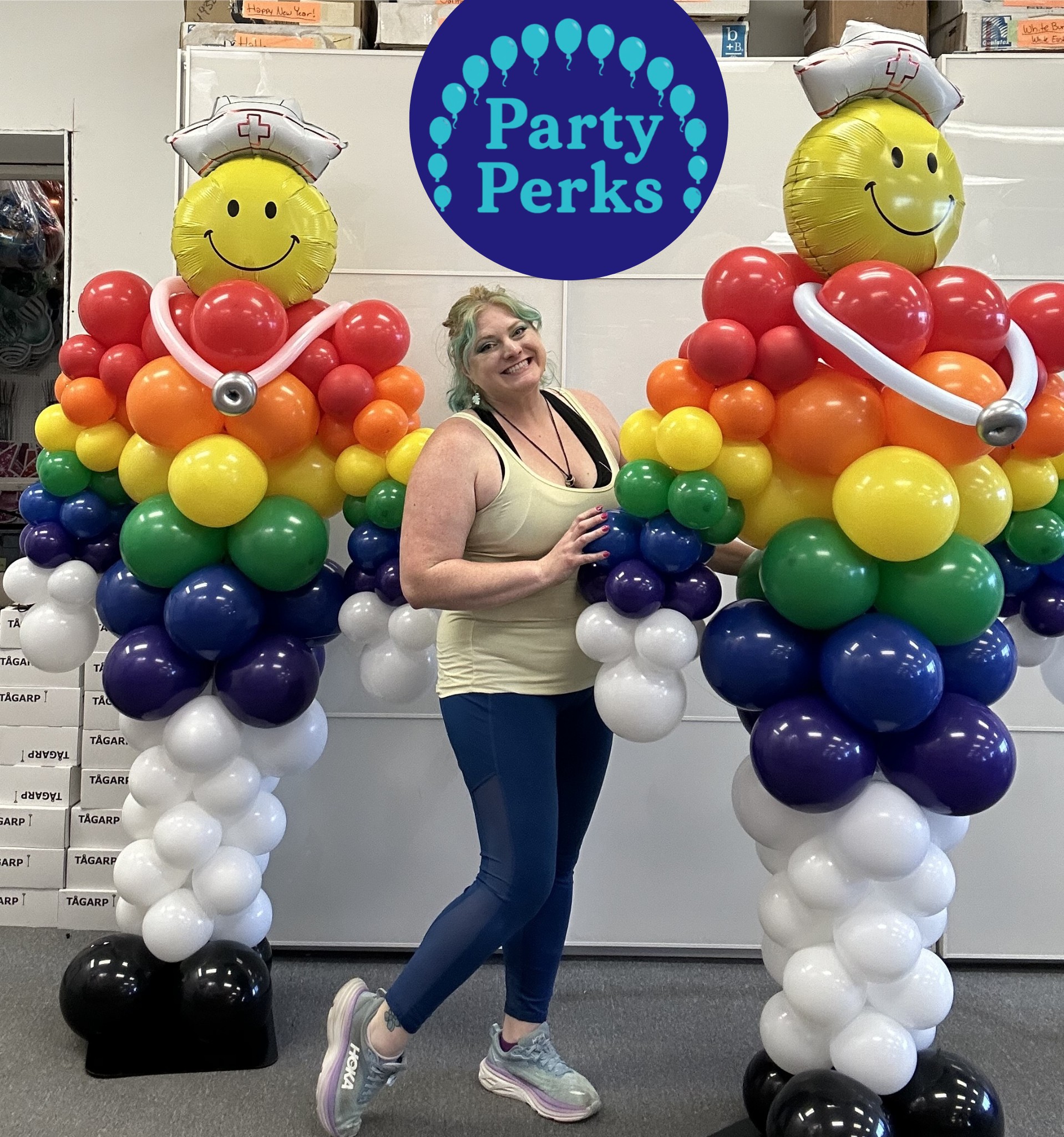 Rainbow balloon nurse sculptures and balloon columns created for Pride healthcare celebration in St Louis